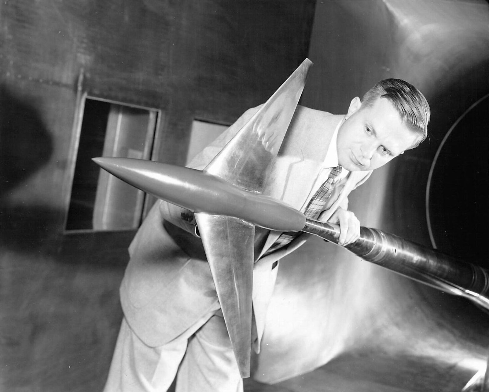 Richard Whitcomb with an area-rule wind-tunnel model at NASA Langley